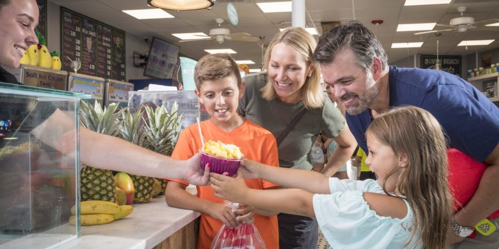 Picture of a family at South Beach Sweets, Bowls & Smoothies on Jenksinson's Boardwalk.